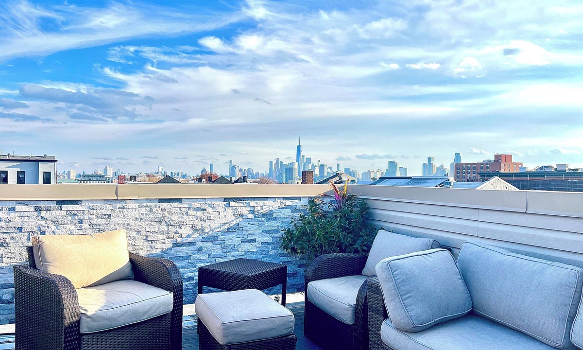 The Heights Condo | Luxury 3-bedroom condo in charming Jersey City with private deck and NYC views