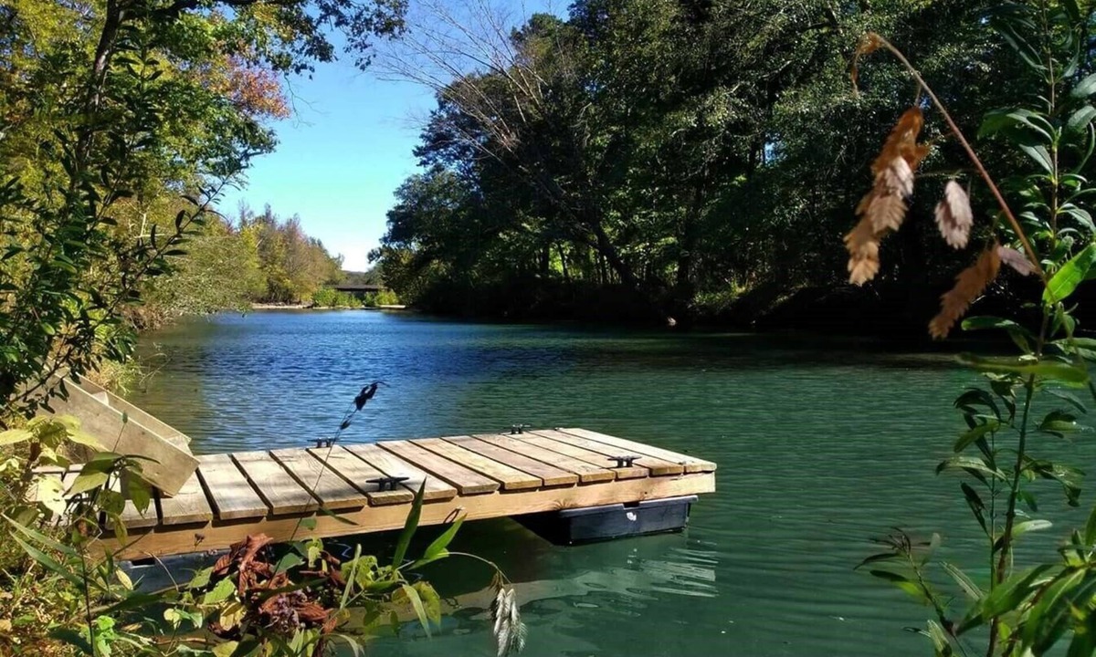 Caddo Gap RV Rental | Private River Tent Camping with Kayaks & Outdoor Bathhouse! Pet friendly!
