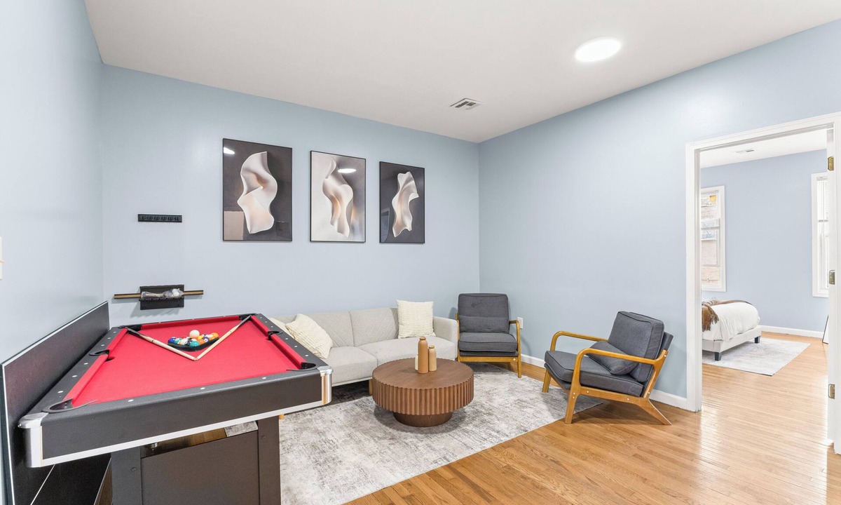 McGinley Square House | Spacious 3-bedroom home - FREE Parking, Pool Table, Ping Pong near NYC!