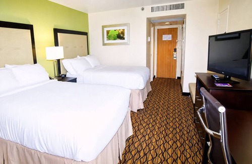 Central City Hotel | Bayside Downtown Retreat with Pet-Friendly Courtyard | Onsite Pools
