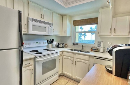 Avon By The Sea Apartment | Beachfront with heated pool, 60 seconds to beach