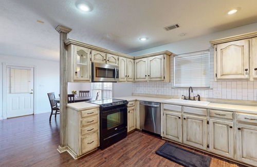 Conway House | Charming home with indoor fireplace, outdoor firepit, and private washer/dryer