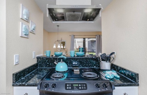 Siesta Key Condo | Heated Pool & Private Lanai in Tropical Siesta Key. Just 30 Feet from the Intracoastal!
