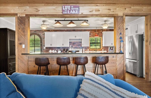 Florien House | Lakefront Luxury with Private Dock, Game Room, Sunset Views & Sleeps 14
