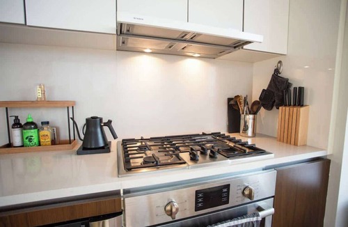 Hell's Kitchen Apartment | Midcentury Designer Luxury High rise Corner 2BR/BA