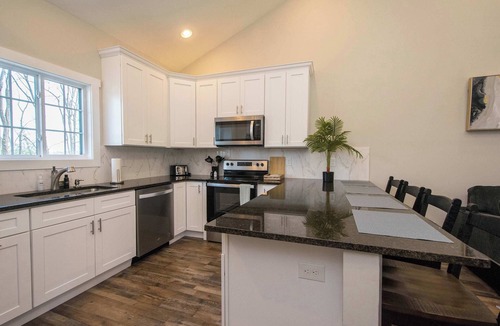 Balfour House | Modern Upper Retreat w/Free Tix | Deck + 2 Suites