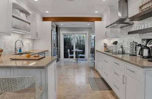 Dolphin Isles House | NEW LISTING! Tropical Beach Villa with Heated Pool and Spa