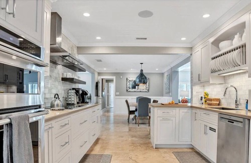 Dolphin Isles House | NEW LISTING! Tropical Beach Villa with Heated Pool and Spa