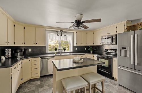 Honey Brook House | Outdoor Oasis with pickleball, swimming pond, basketball, shuffleboard & pavilion with kitchen