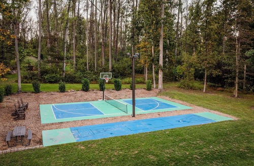 Honey Brook House | Outdoor Oasis with pickleball, swimming pond, basketball, shuffleboard & pavilion with kitchen
