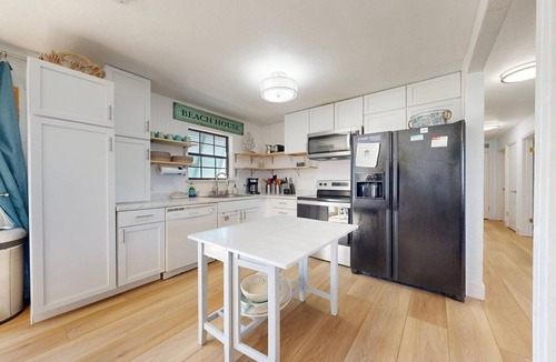 Shibui Sands House | Pet Friendly with Large Fenced Yard, Golf Cart Access