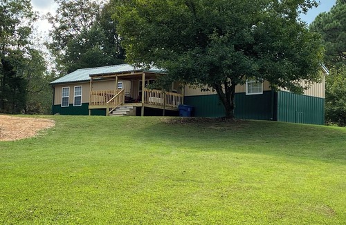 Milan House | Retreat to the peaceful Tennessee countryside. Pet-friendly.
