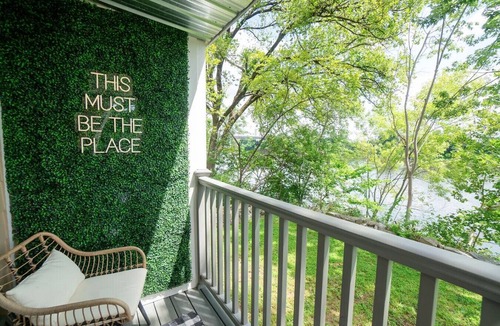 North Capitol Condo | Riverfront Oasis| Pool | King Bed Walk to Broadway