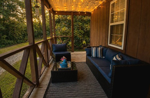 Marshall House | Secluded Magnolia Cabin & Hot Tub