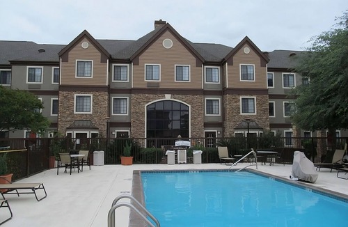 Vance Jackson Apartment | Two Comfortable 2BR Suites w/Full Kitchen | Outdoor Pool | Free Breakfast
