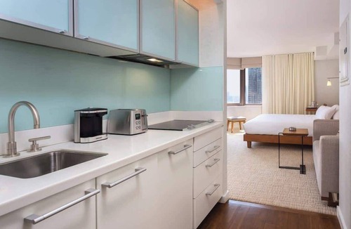 Midtown East Condo | Wyndham Midtown 45 Resort | King Bed Hotel Room