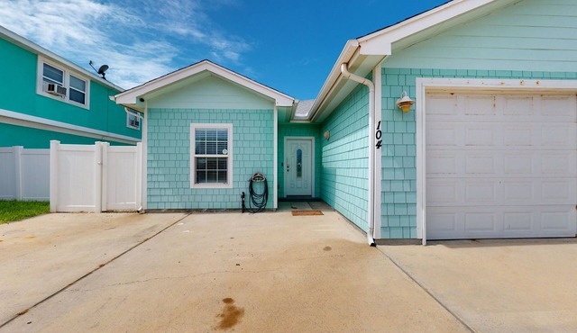Dog-friendly duplex near beach with pool, central AC, & W/D