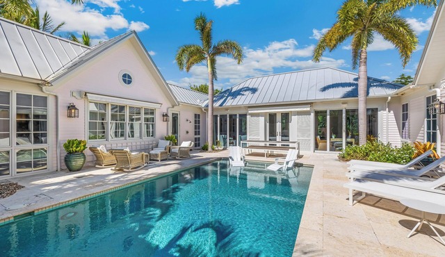 Experience luxury in this spacious 4-bedroom, 5-bathroom single-family home with a pool.