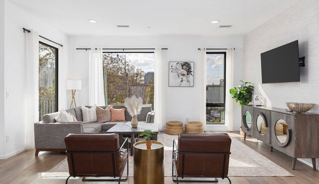 Luxury on the River - Walk to Downtown, 2 Private Patios & Garage Parking
