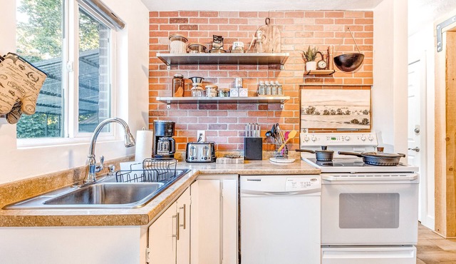 Newly-renovated, dog-friendly home w/ a private hot tub & large grassy yard