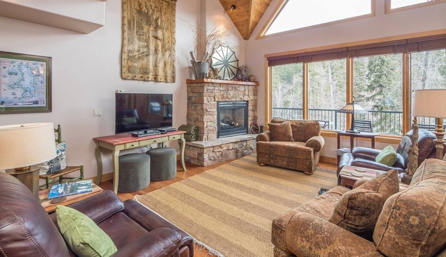 Riverfront Bigfork Condo w/AC - Steps to Downtown, Stunning Swan River Views & Fireplace